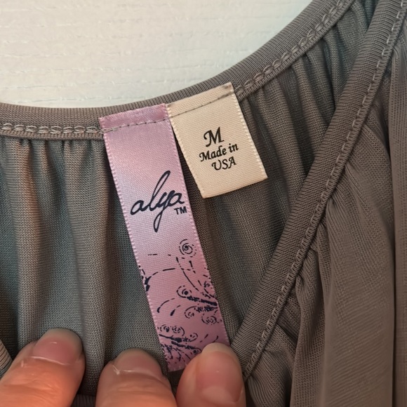 Gray off the should with adjustable toes tank top. Open sleeves with ties. - Picture 3 of 4